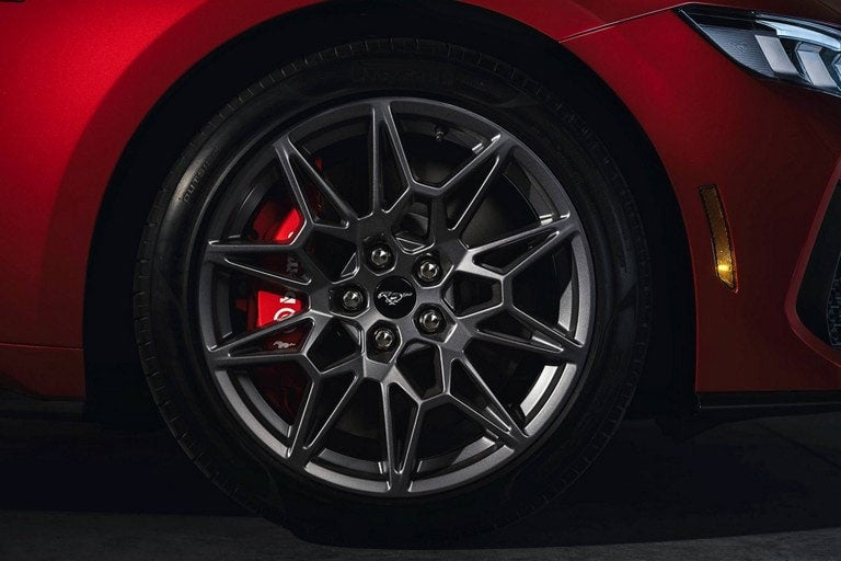2024 Ford Mustang® model with a close-up of a wheel and brake caliper | Woody Ford in Madill OK